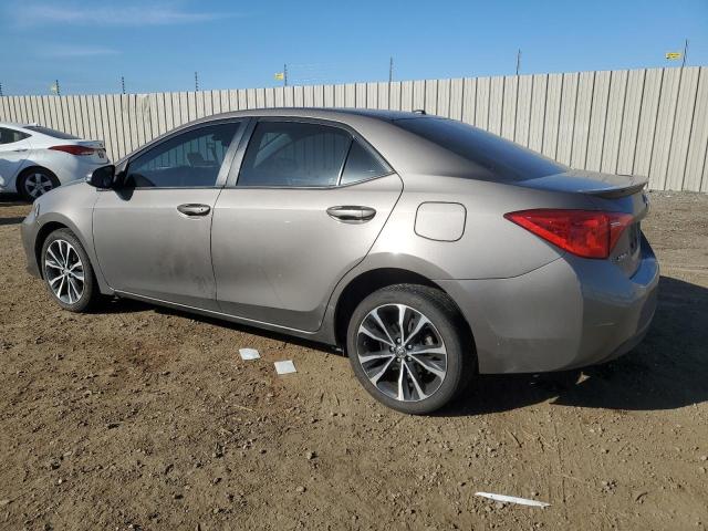 5YFBURHE0HP699780 - 2017 TOYOTA COROLLA L TAN photo 2