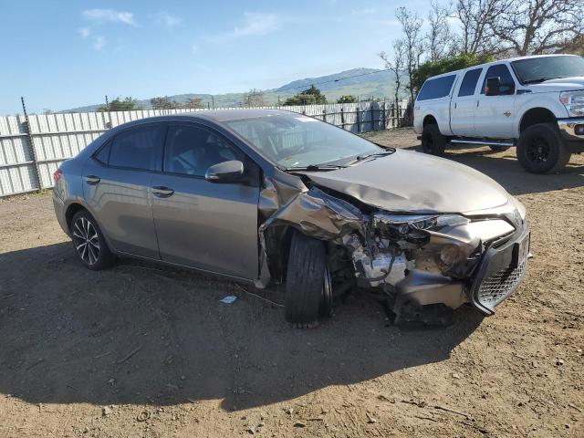 5YFBURHE0HP699780 - 2017 TOYOTA COROLLA L TAN photo 4