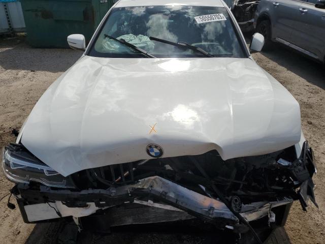 3MW5R7J03L8B34298 - 2020 BMW 330XI WHITE photo 11