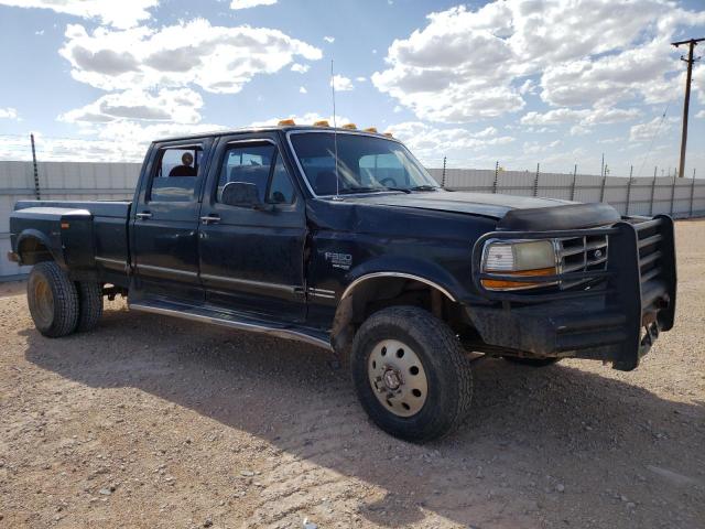 1FTJW36F1VEA46575 - 1997 FORD F350 BLACK photo 4