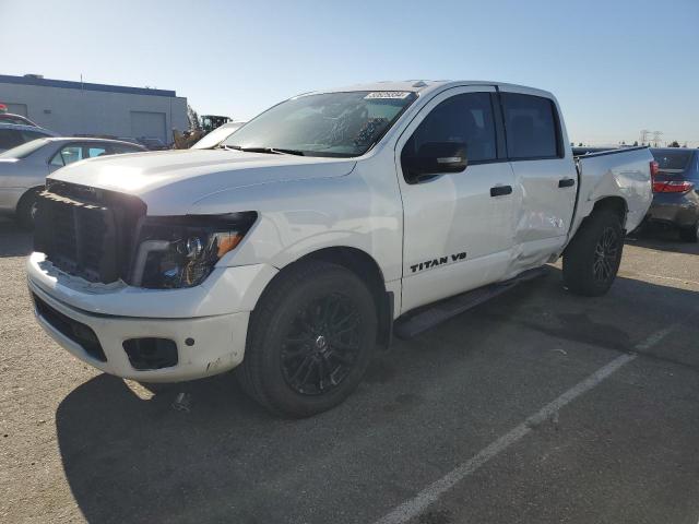 1N6AA1E68JN533364 - 2018 NISSAN TITAN SV WHITE photo 1