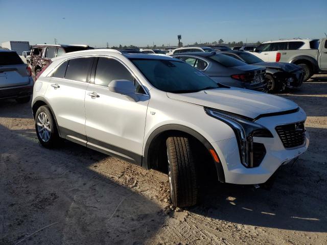 1GYAZAR42PF104271 - 2023 CADILLAC XT4 LUXURY WHITE photo 4