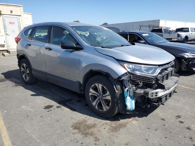 5J6RW6H33KL001016 - 2019 HONDA CR-V LX SILVER photo 4