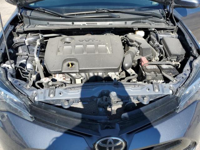 5YFBURHEXJP794627 - 2018 TOYOTA COROLLA L BLUE photo 11