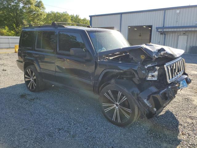 1J8HG48N57C550267 - 2007 JEEP COMMANDER BLACK photo 4