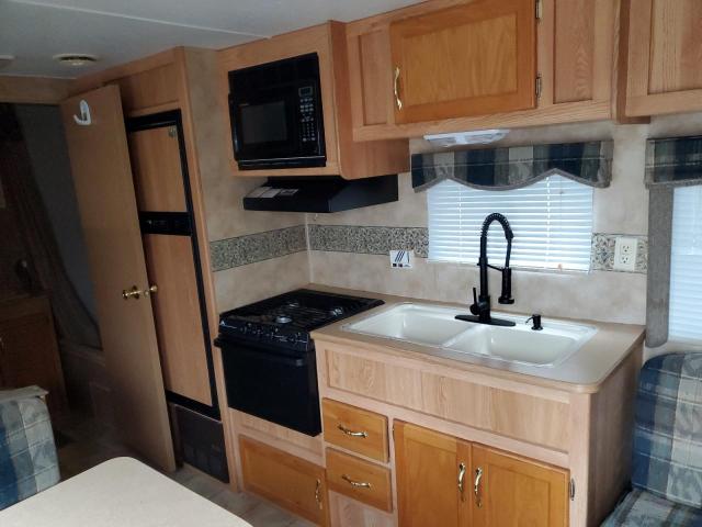 4YDT27B2837309853 - 2003 KEYSTONE HORNET WHITE photo 6