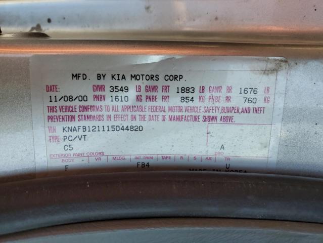 KNAFB121115044820 - 2001 KIA SEPHIA BASE SILVER photo 12