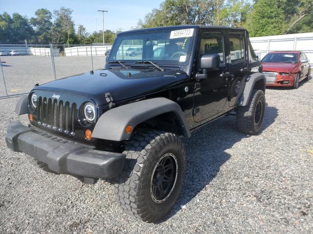 1J4GA39109L785005 - 2009 JEEP WRANGLER U X BLACK photo 1