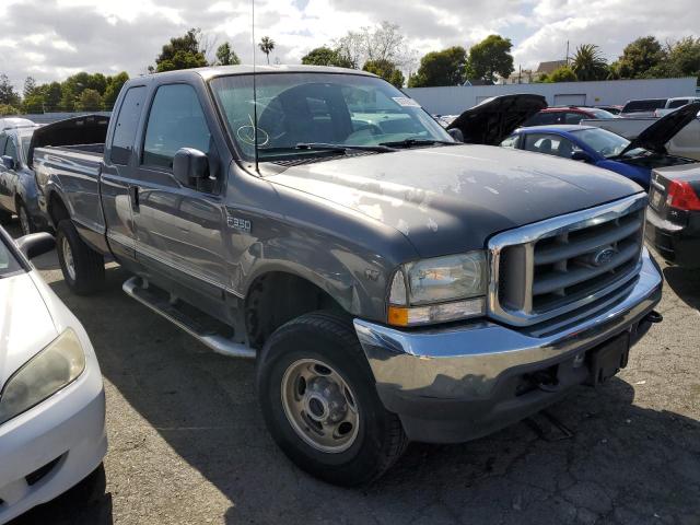 1FTSX31SX2EA28738 - 2002 FORD F350 SRW SUPER DUTY GRAY photo 4