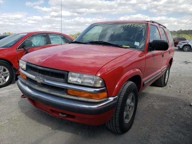 1GNDT13WXY2405661 - 2000 CHEVROLET BLAZER RED photo 1