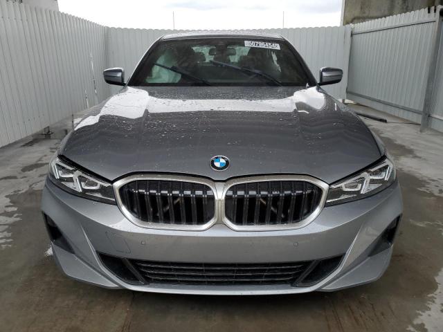 3MW69FF02R8E39128 - 2024 BMW 330I GRAY photo 5