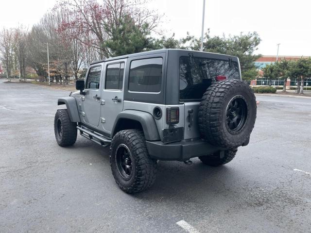 1C4BJWDG6DL582092 - 2013 JEEP WRANGLER U SPORT ვერცხლისფერი ფოტო 3