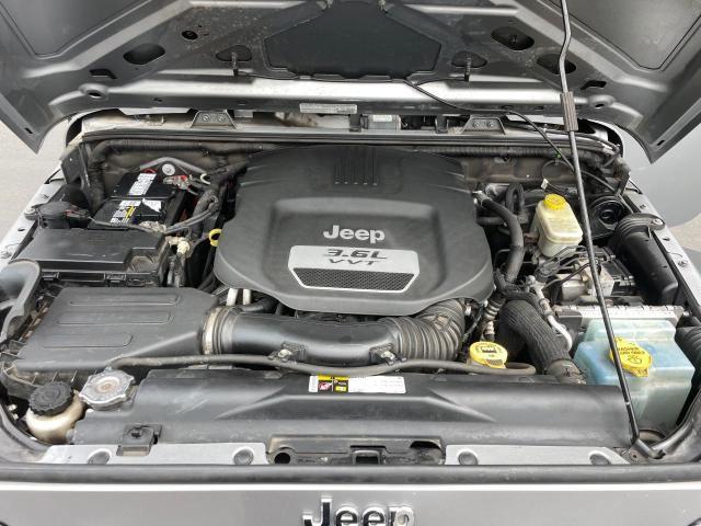 1C4BJWDG6DL582092 - 2013 JEEP WRANGLER U SPORT ვერცხლისფერი ფოტო 7