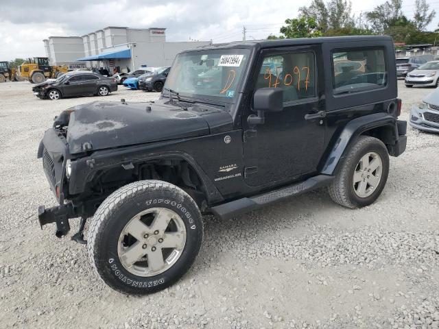 1J4FA541X9L730141 - 2009 JEEP WRANGLER SAHARA BLACK photo 1