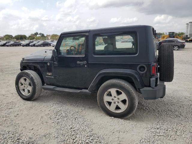 1J4FA541X9L730141 - 2009 JEEP WRANGLER SAHARA BLACK photo 2