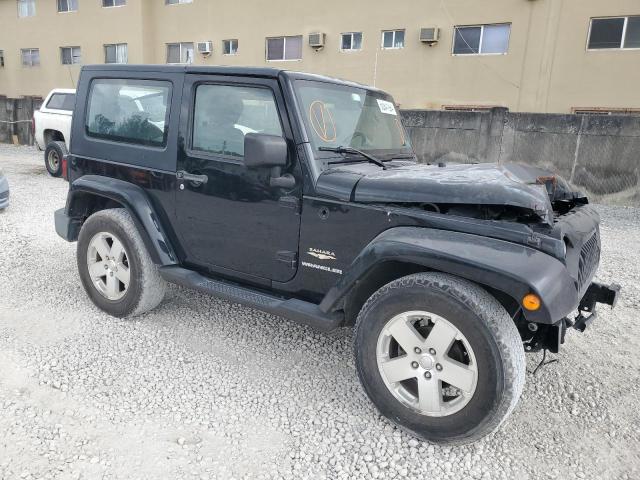 1J4FA541X9L730141 - 2009 JEEP WRANGLER SAHARA BLACK photo 4