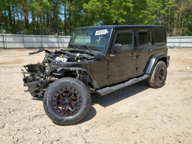 1C4BJWEG2GL125475 - 2016 JEEP WRANGLER U SAHARA BLACK photo 1