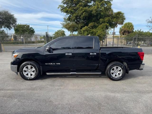 1N6AA1EK7JN542912 - 2018 NISSAN TITAN S Noir photo 12