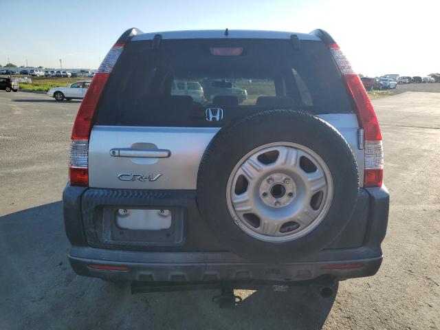 JHLRD68566C011304 - 2006 HONDA CR-V LX SILVER photo 6