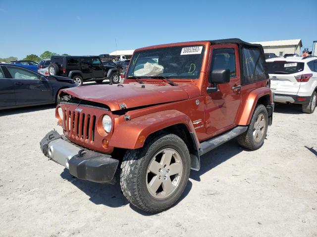 1J4FA54149L785913 - 2009 JEEP WRANGLER SAHARA ORANGE photo 1