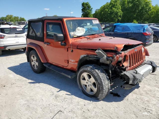 1J4FA54149L785913 - 2009 JEEP WRANGLER SAHARA ORANGE photo 4