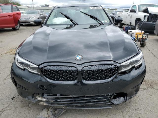 3MW5R7J56K8A04915 - 2019 BMW 330XI შავი ფოტო 5