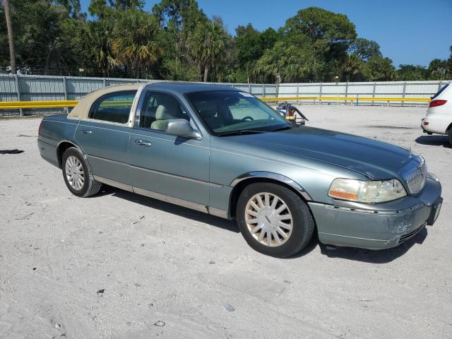 1LNHM81W64Y644937 - 2004 LINCOLN TOWN CAR EXECUTIVE Blau Foto 4