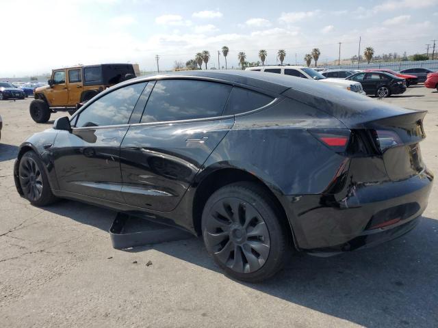 5YJ3E1EA3PF652273 - 2023 TESLA MODEL 3 Schwarz Foto 2