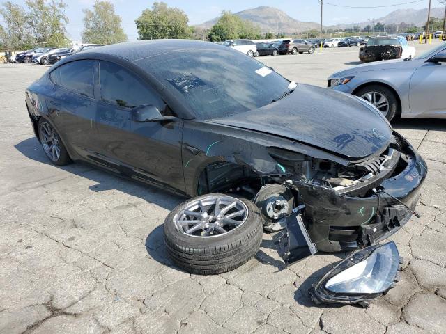 5YJ3E1EA3PF652273 - 2023 TESLA MODEL 3 Schwarz Foto 4