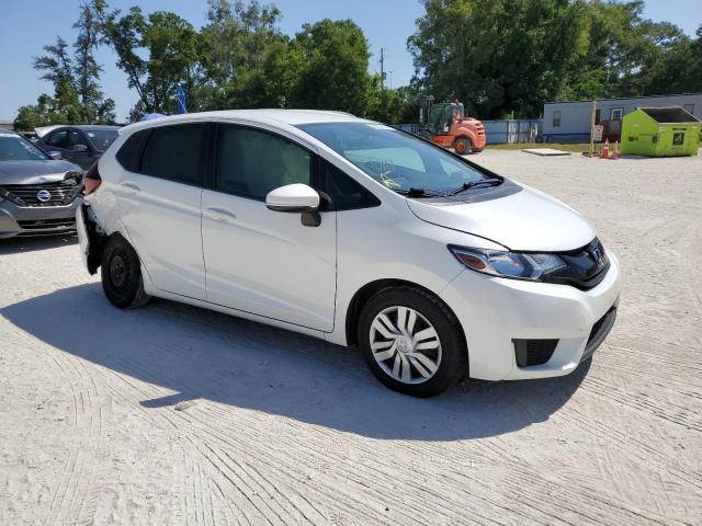 JHMGK5H59HS010854 - 2017 HONDA FIT LX WHITE photo 4