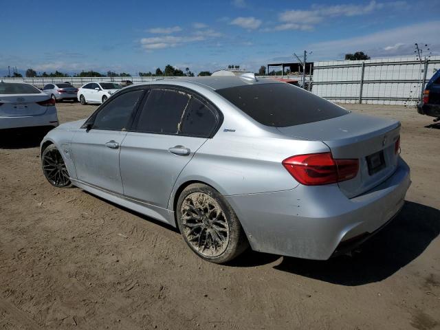 WBA8E1C56JA756345 - 2018 BMW 330E SILVER photo 2