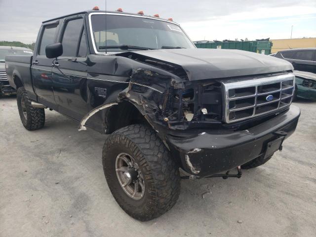 1FTHW26F3VEB41776 - 1997 FORD F250 BLACK photo 4