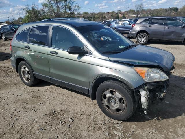 JHLRE38397C010983 - 2007 HONDA CR-V LX GREEN photo 4