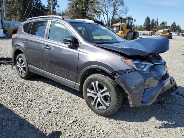 JTMBFREV5HJ131138 - 2017 TOYOTA RAV4 LE CHARCOAL photo 4