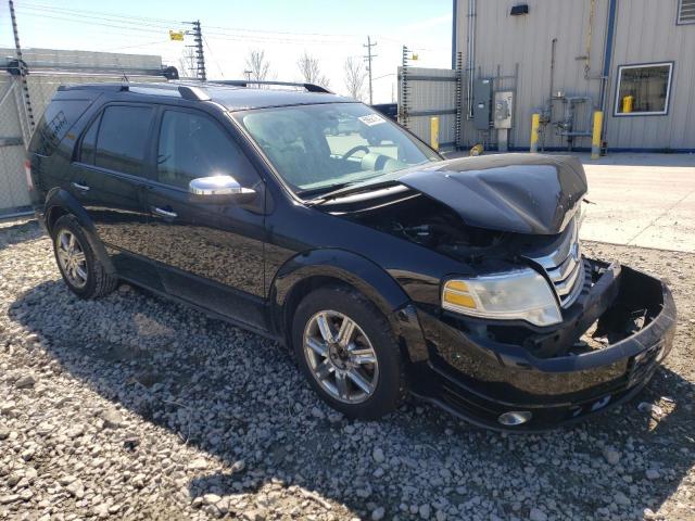 1FMDK03W48GA12162 - 2008 FORD TAURUS X LIMITED BLACK photo 4