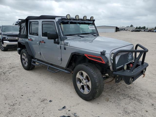 1C4BJWDG6FL707739 - 2015 JEEP WRANGLER U SPORT SILVER photo 4