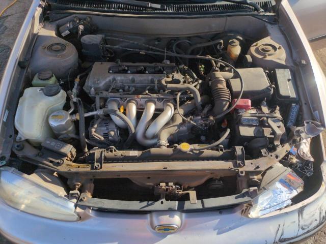1Y1SK548XYZ422182 - 2000 CHEVROLET GEO PRIZM BASE SILVER photo 11