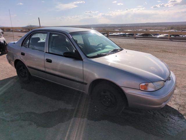 1Y1SK548XYZ422182 - 2000 CHEVROLET GEO PRIZM BASE SILVER photo 4