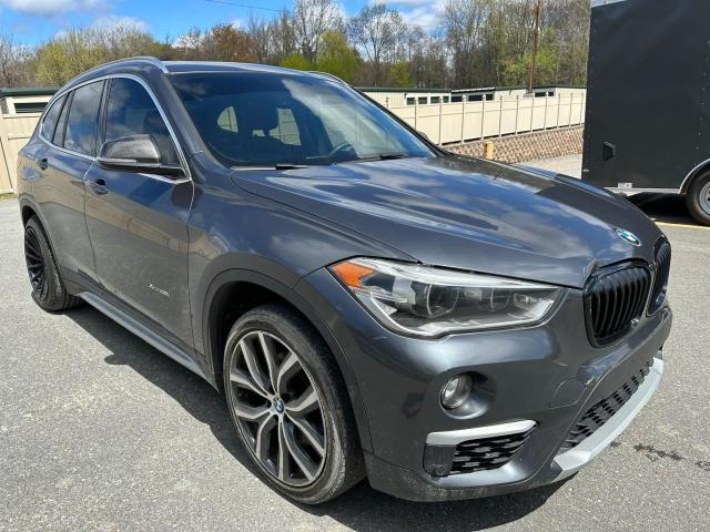 WBXHT3C32H5F70135 - 2017 BMW X1 XDRIVE28I BLACK photo 4