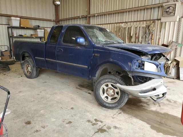 1FTDX1862VKD44064 - 1997 FORD F150 BLUE photo 4