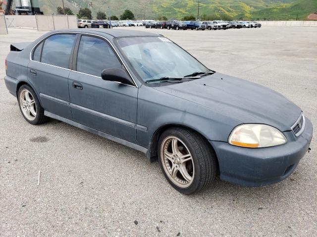 1HGEJ6678WL018734 - 1998 HONDA CIVIC LX GREEN photo 4