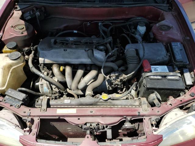 1NXBR12E2WZ082257 - 1998 TOYOTA COROLA SR5 VE MAROON photo 11