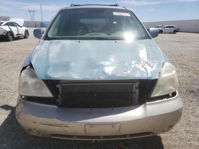 KNDMB233866081994 - 2006 KIA SEDONA EX BLUE photo 5