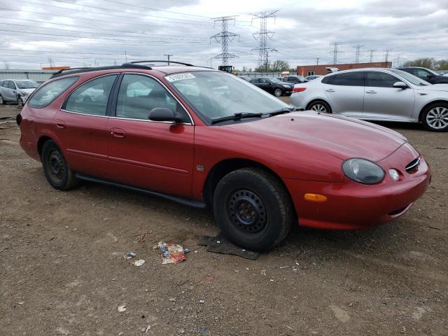 1FAFP58S4XG131044 - 1999 FORD TAURUS SE COMFORT RED photo 4