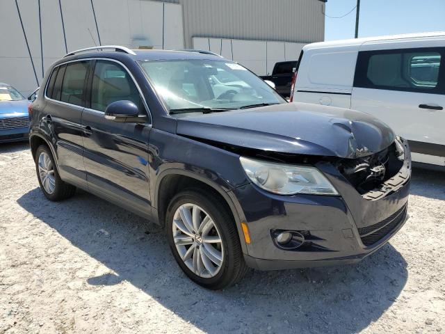 WVGAV7AX2BW525034 - 2011 VOLKSWAGEN TIGUAN S BLUE photo 4