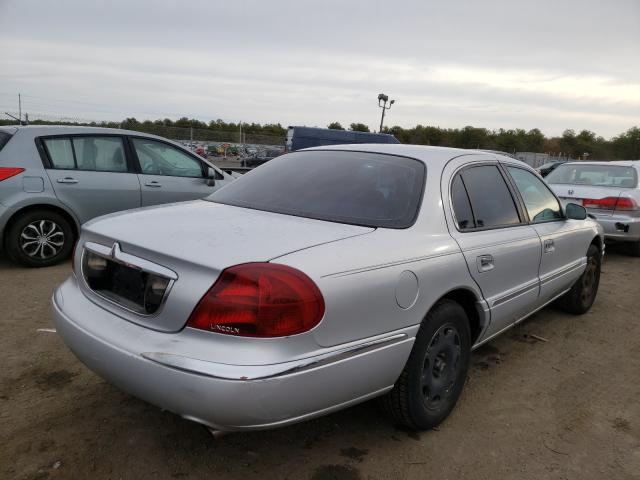 1LNFM97V3WWY74074 - 1998 LINCOLN CONTINENTA SILVER photo 4