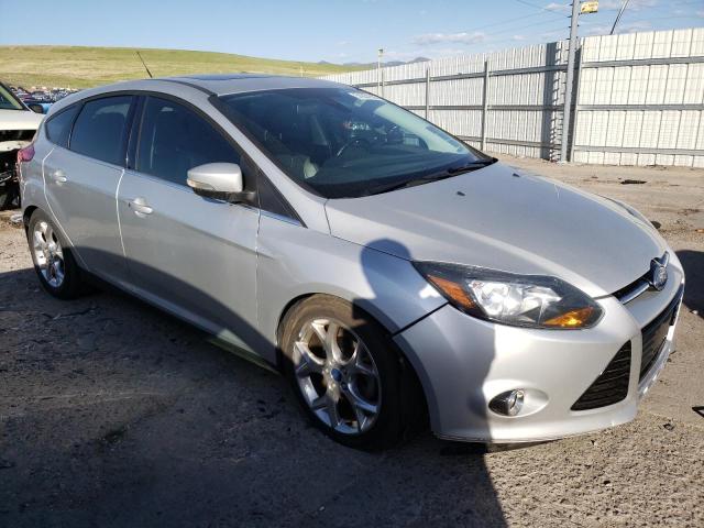 1FAHP3N26CL189286 - 2012 FORD FOCUS TITANIUM SILVER photo 4