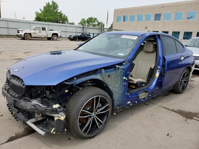 WBA5R7C51KAJ85083 - 2019 BMW 330XI Blau Foto 1
