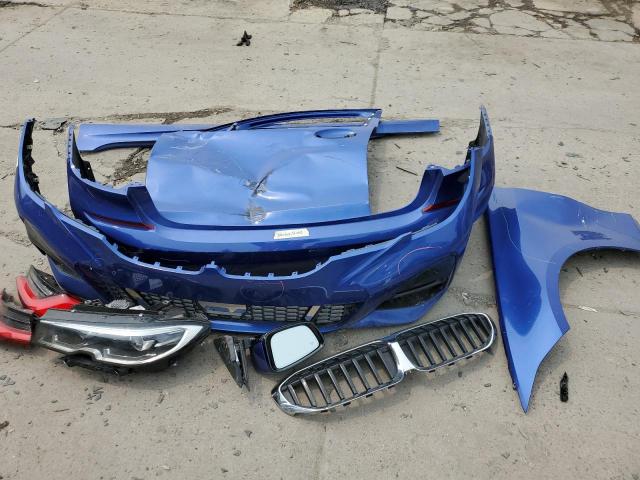 WBA5R7C51KAJ85083 - 2019 BMW 330XI Blau Foto 12