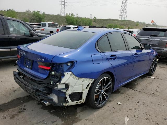 WBA5R7C51KAJ85083 - 2019 BMW 330XI Blau Foto 3